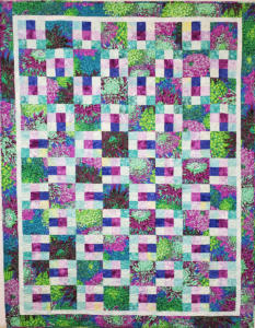 Purple-background-Flower-and-9-patch-quilt